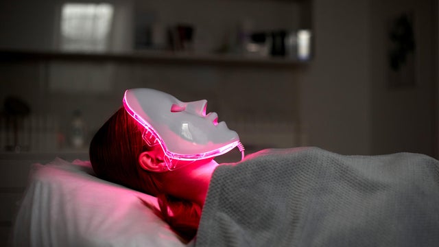 Photodynamic therapy. Cosmetic face mask. the girl is wearing a mask. Health and beauty. 