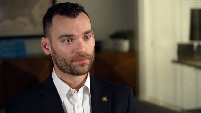 The FBI seal and a U.S. flag 